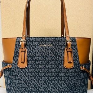 Michael Kors Signature east west voyager Navy and Tan Tote